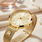 Tommy Hilfiger Women’s Gold Monogram Mesh Watch – Model 1782588