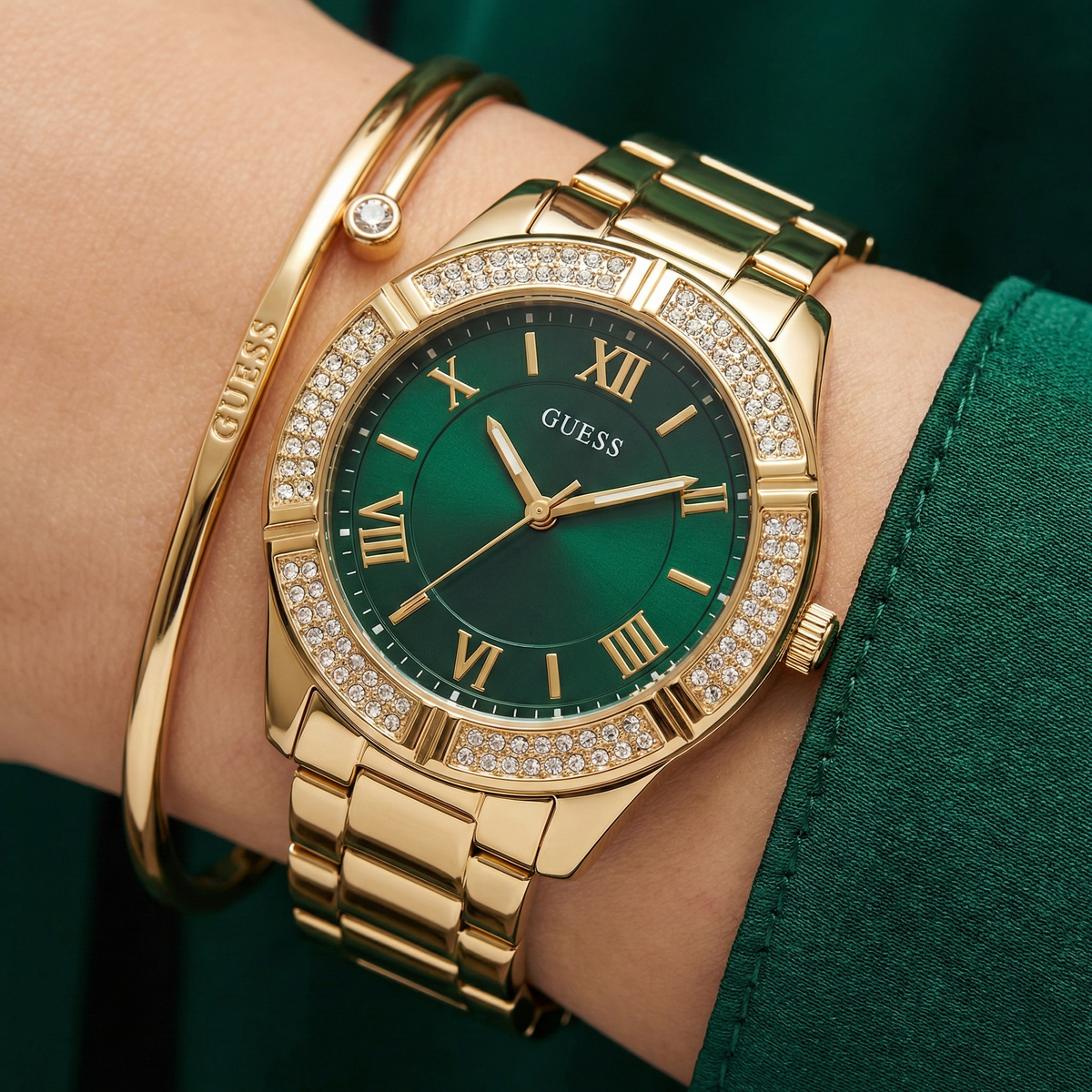 ساعة كوسمو GW0033L8 نسائية ذهبية وخضراء من Guess