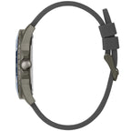 ساعة Guess Odyssey W1108G6 بهيكل بلون رصاصي داكن، ومينا أزرق سماوي، وحزام مطاطي رمادي