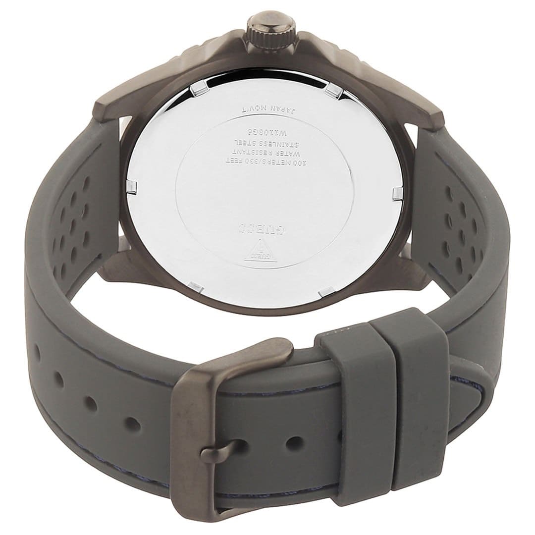 ساعة Guess Odyssey W1108G6 بهيكل بلون رصاصي داكن، ومينا أزرق سماوي، وحزام مطاطي رمادي