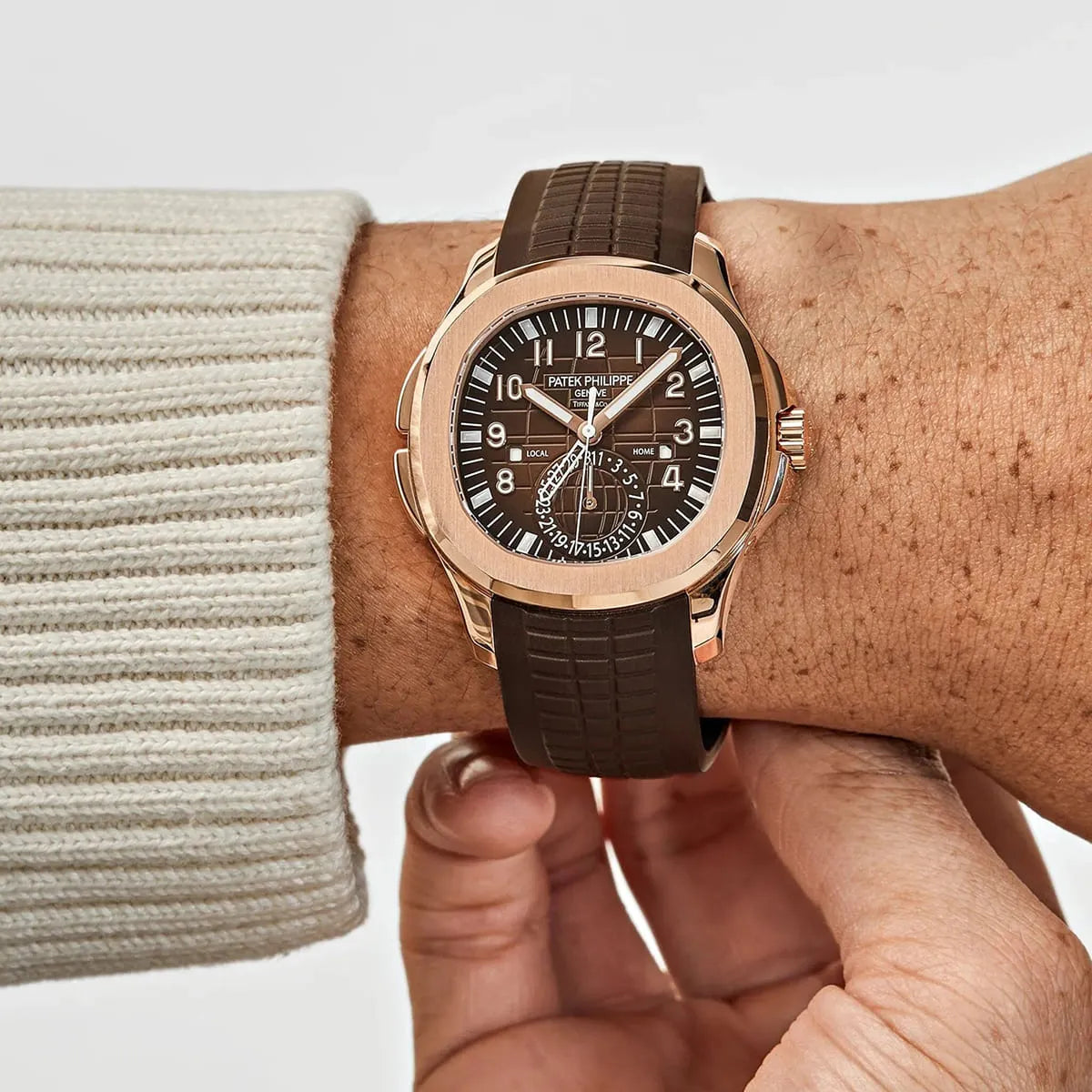 Patek Philippe Men’s Aquanaut Travel Time Rose Gold Brown Dial Watch