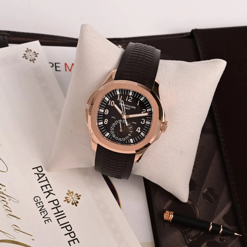 Patek Philippe Men’s Aquanaut Travel Time Rose Gold Brown Dial Watch