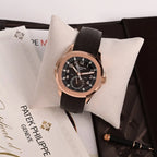 Patek Philippe Men’s Aquanaut Travel Time Rose Gold Brown Dial Watch