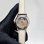 Patek Philippe Men’s Nautilus White Dial Black Strap Watch