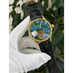 Patek Philippe Men’s Rose Gold Tone Green Dial Watch