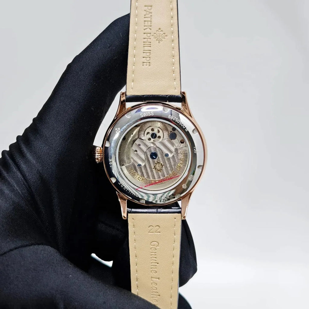 Patek Philippe Men’s Rose Gold Tone Green Dial Watch