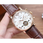 Patek Philippe Men’s Annual Calendar Open-Heart Rose Gold-Tone Watch