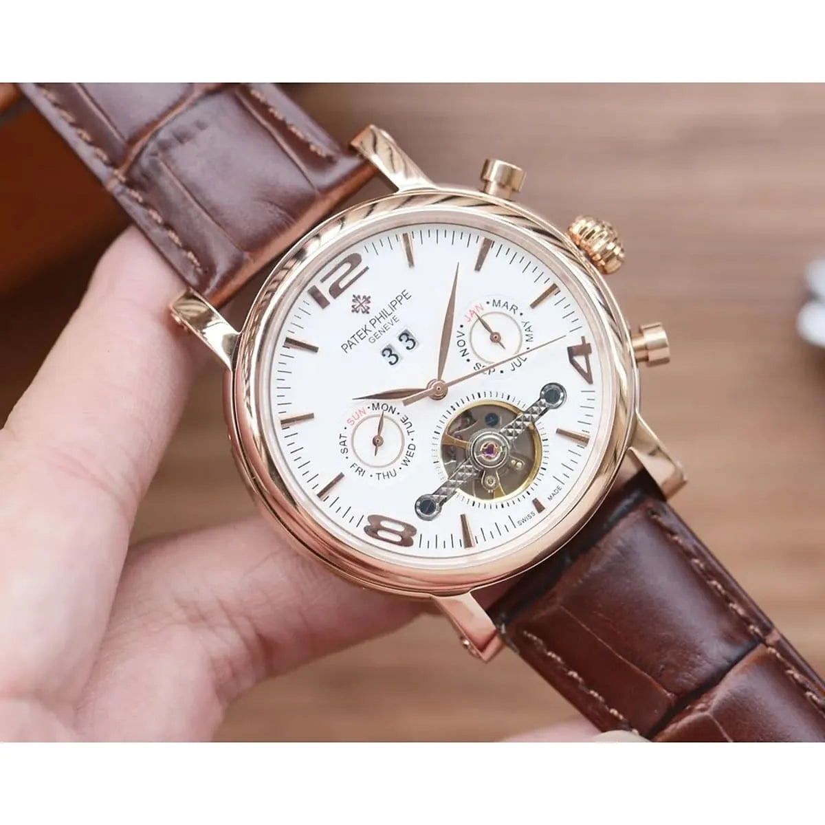 Patek Philippe Men’s Annual Calendar Open-Heart Rose Gold-Tone Watch