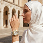 Guess Zena Multi-Function W1094L1 Silver Case Gold Bezel White Rubber Women's Watch