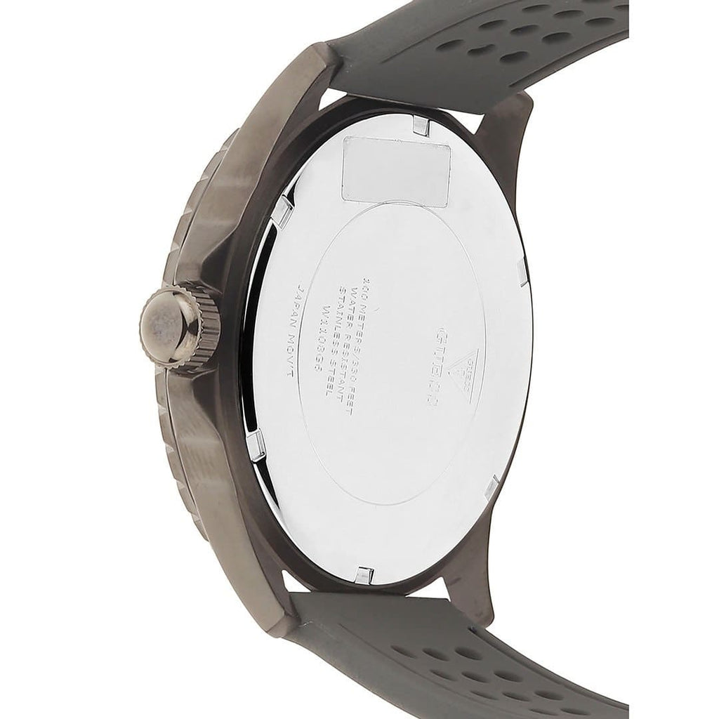 ساعة Guess Odyssey W1108G6 بهيكل بلون رصاصي داكن، ومينا أزرق سماوي، وحزام مطاطي رمادي