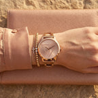 Guess W1145L4 Rose Gold Case Triangle Logo Rose Gold Bangle Women's Watch